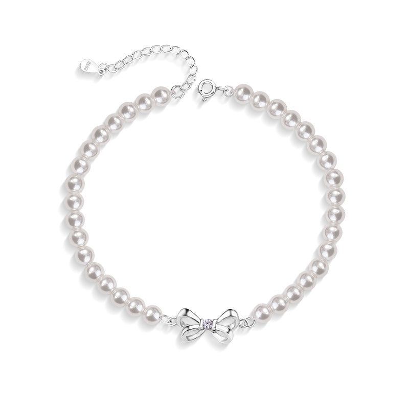 Armband aus 925er Sterlingsilber – Schleife und Perlendetail