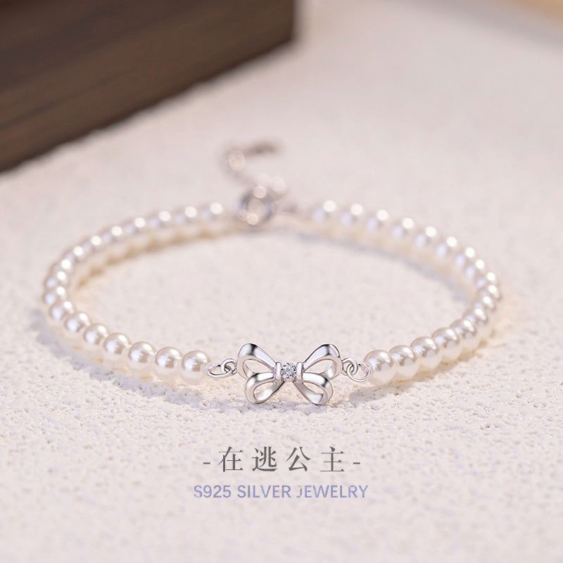 Armband aus 925er Sterlingsilber – Schleife und Perlendetail