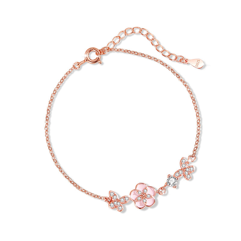 Armband aus 925er Sterlingsilber – Schmetterling und Pfirsichblüte und Zirkonia-Akzente