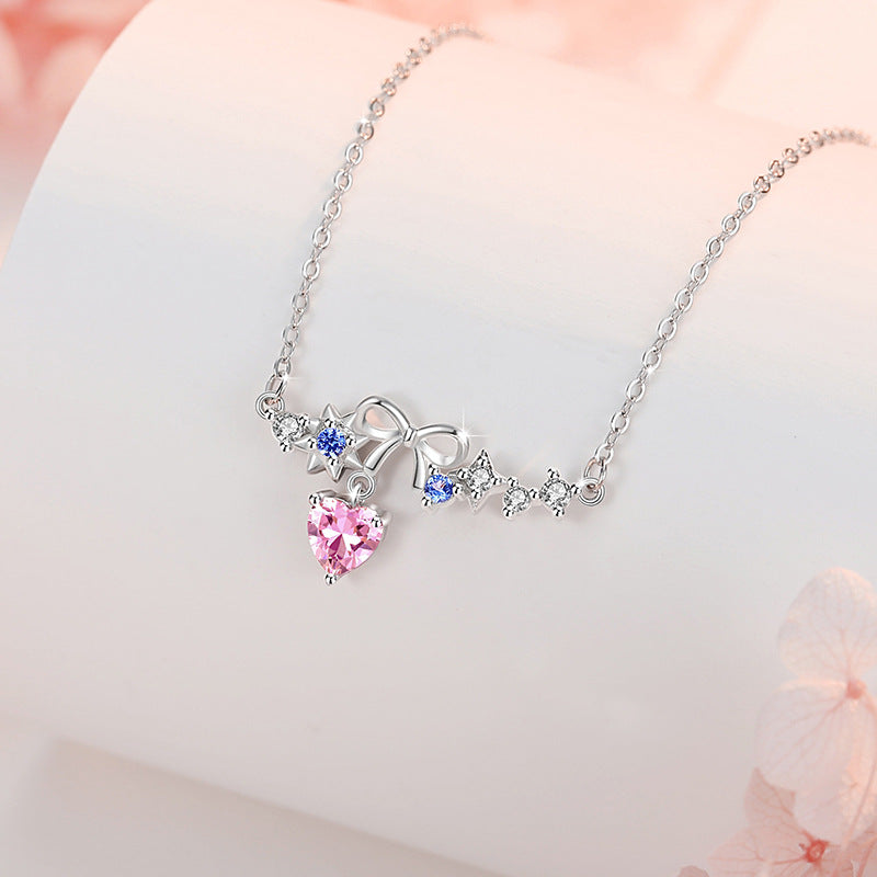 Sterling Silver Star and Bow Necklace
