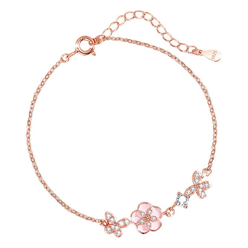 Armband aus 925er Sterlingsilber – Schmetterling und Pfirsichblüte und Zirkonia-Akzente