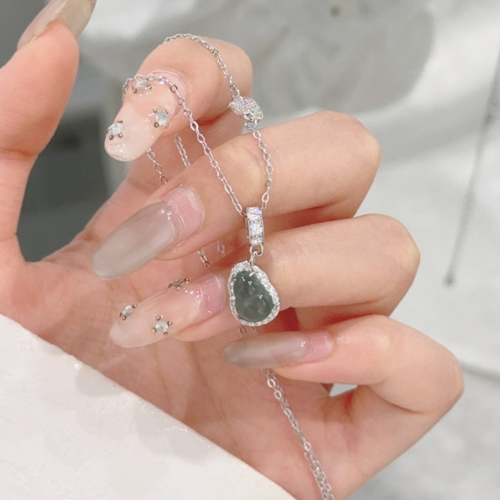 Halskette aus 925er Sterlingsilber – Kalebasse und Jade