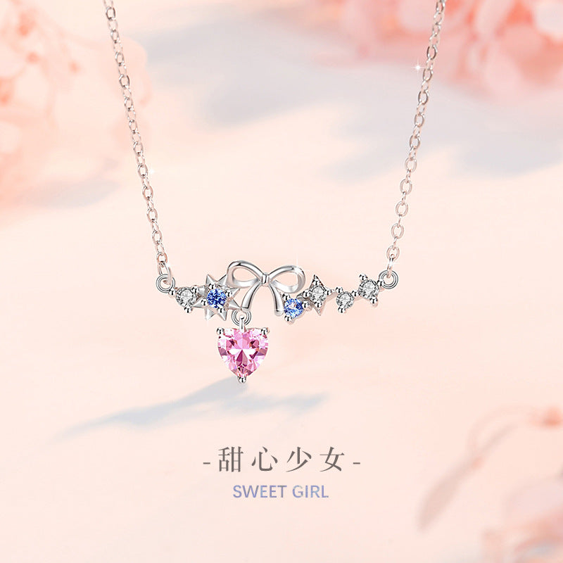Sterling Silver Star and Bow Necklace