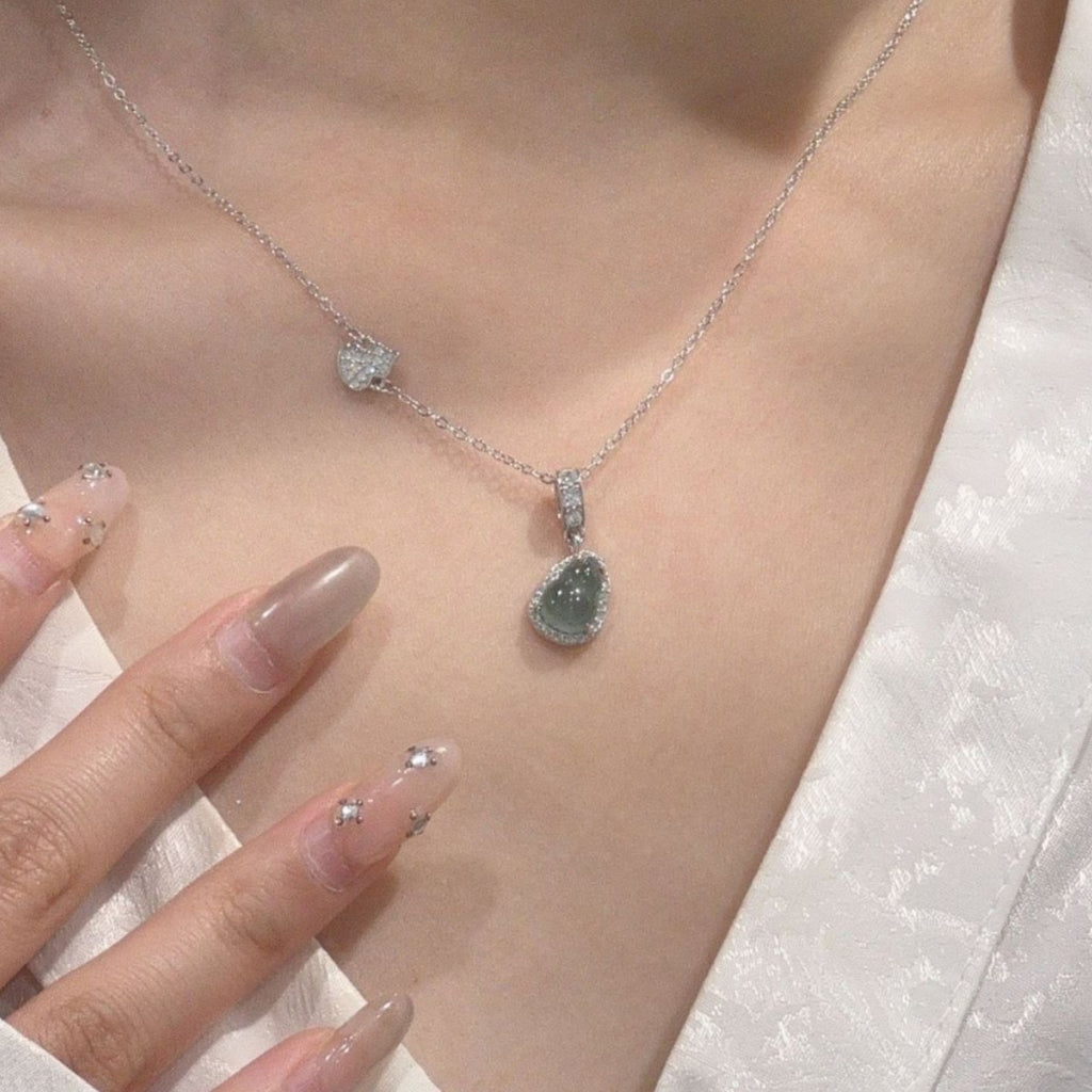 Halskette aus 925er Sterlingsilber – Kalebasse und Jade