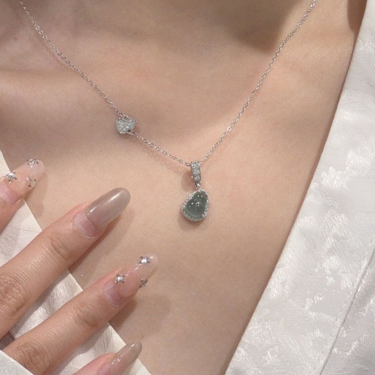 Halskette aus 925er Sterlingsilber – Kalebasse und Jade