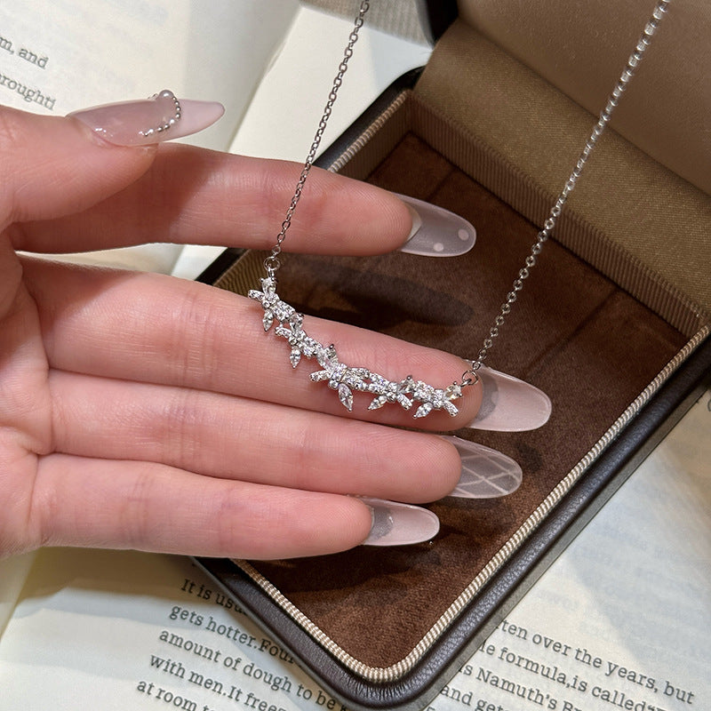 Wisteria Flower Pure Silver 999 Necklace Female Niche Design Light Luxury Flower Clavicle Chain Ins Style Smile Zircon Pendant