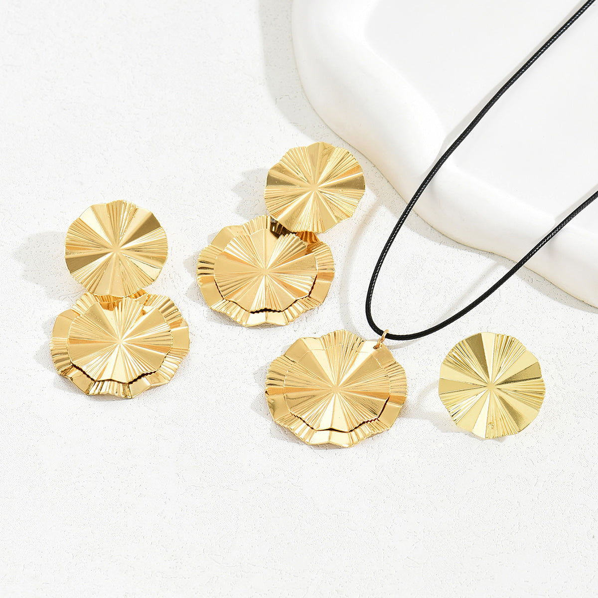 Folded Round Disc Jewelry — product image 3