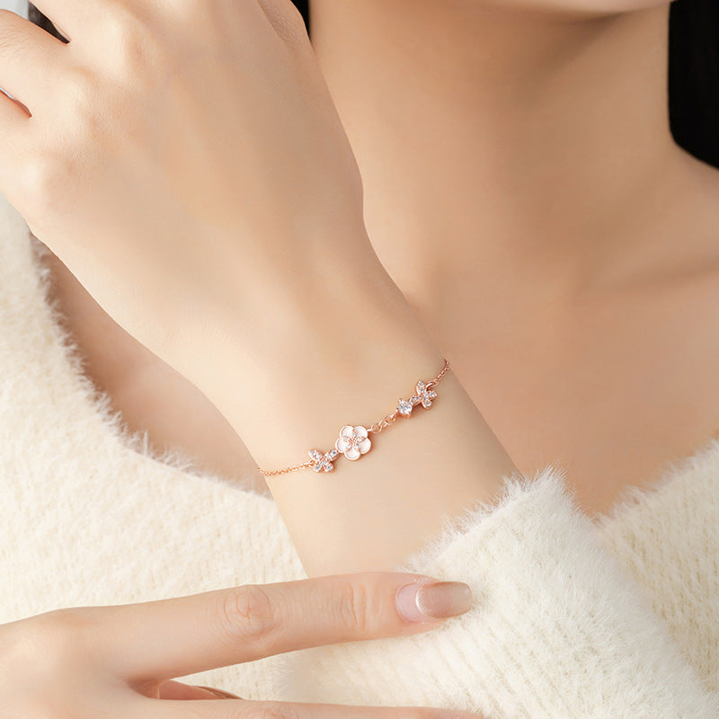 Armband aus 925er Sterlingsilber – Schmetterling und Pfirsichblüte und Zirkonia-Akzente