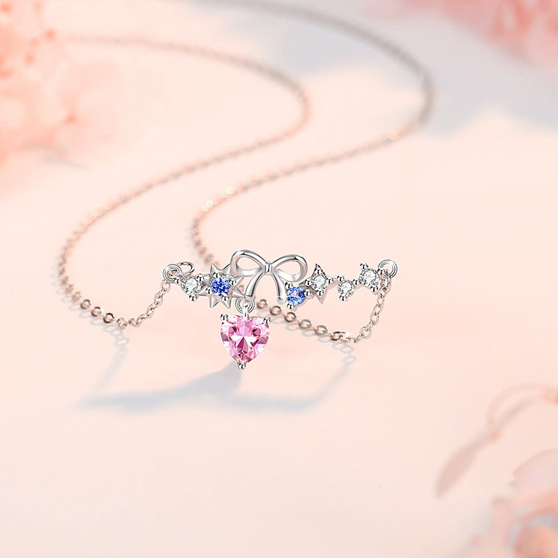 Sterling Silver Star and Bow Necklace