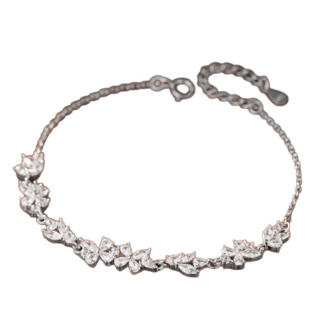 Armband aus 925er Sterlingsilber – Schmetterling und Blauregen